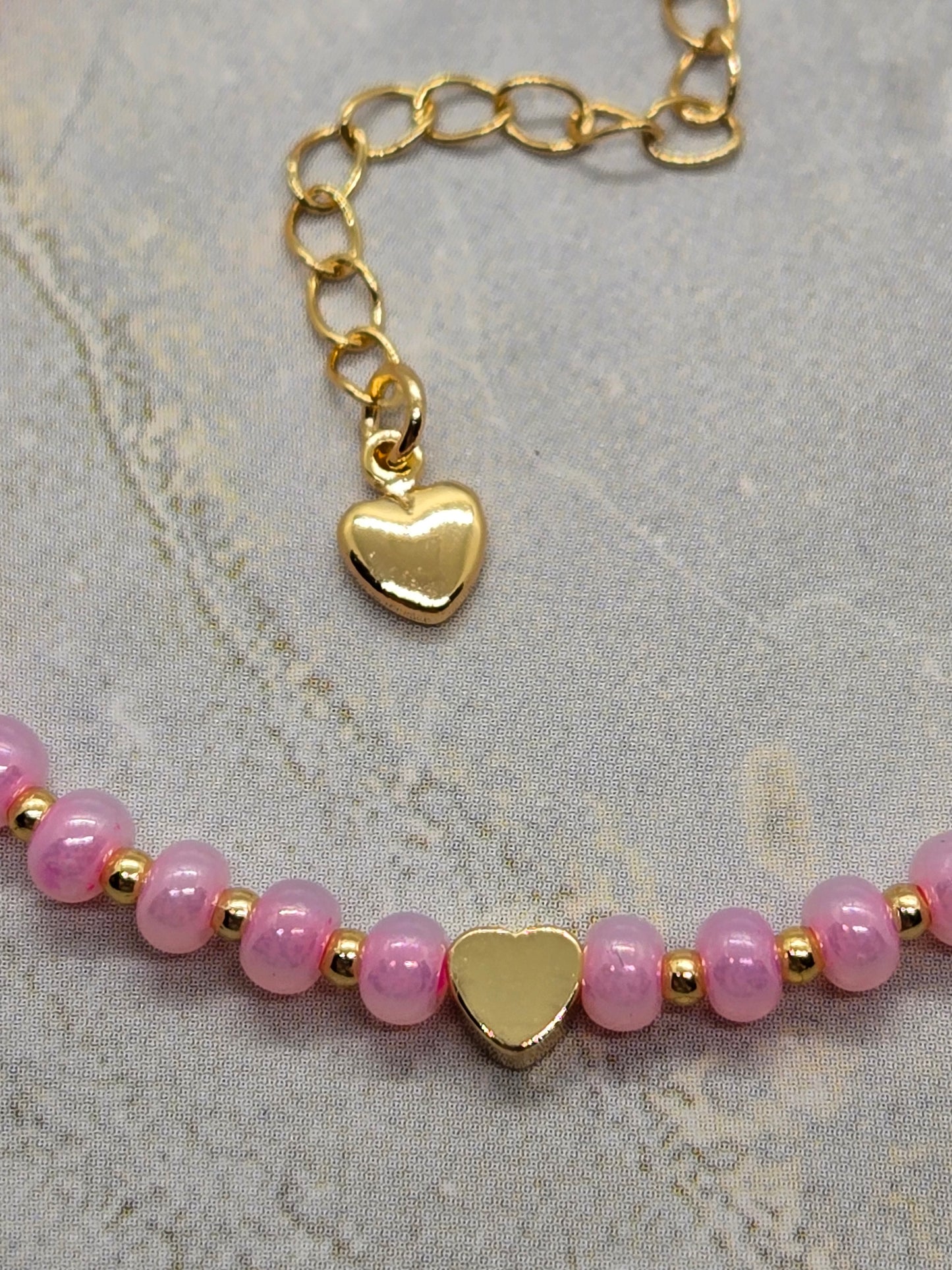 Pink Glass and gold heart plated beads