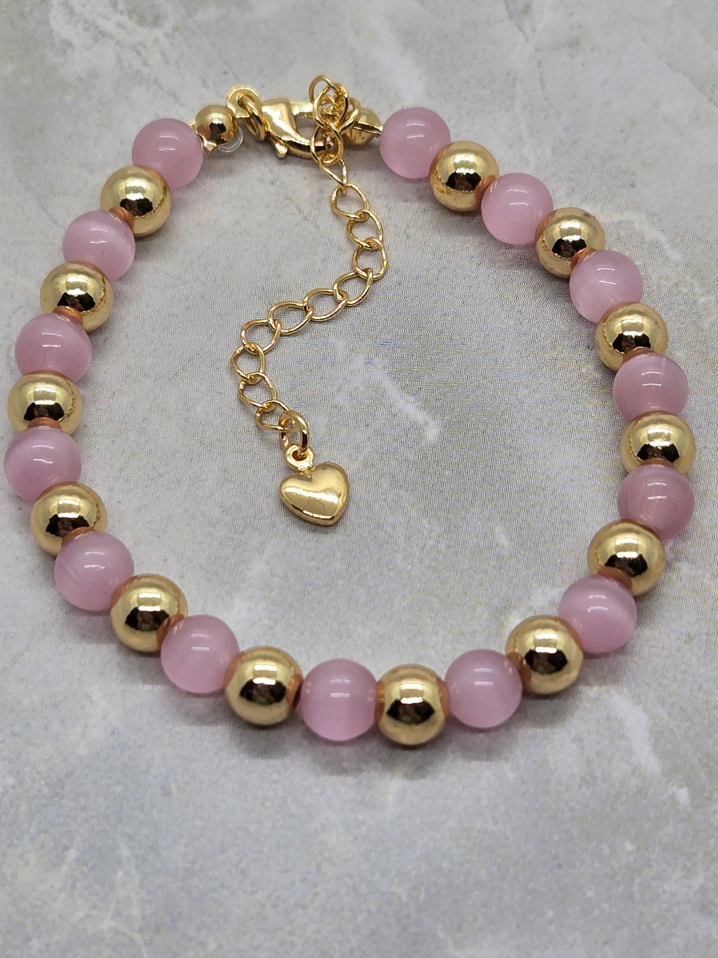 Pink Glass and gold plated beads