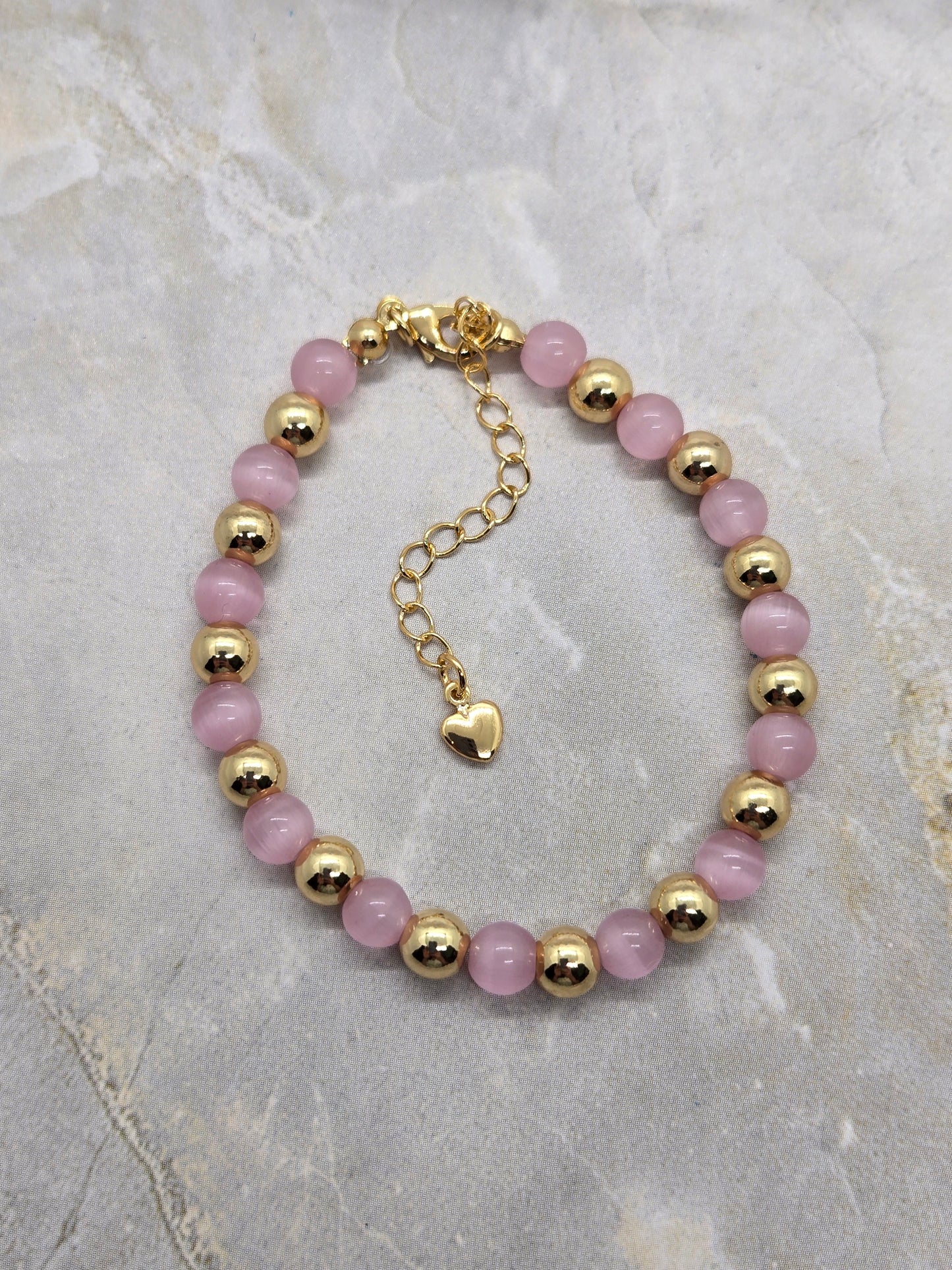 Pink Glass and gold plated beads