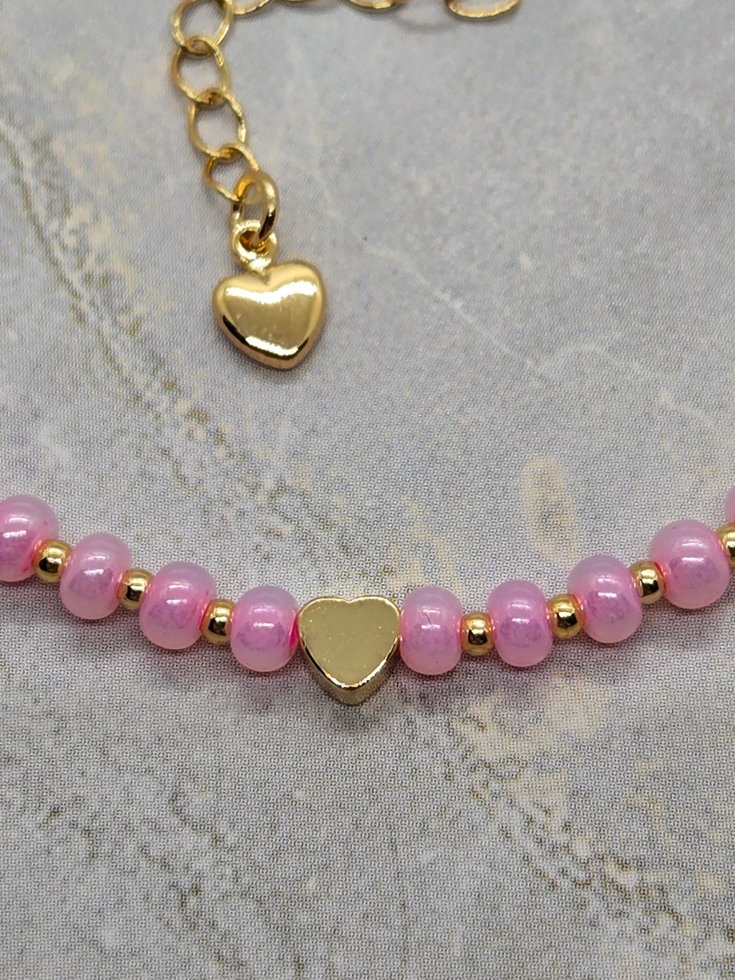 Pink Glass and gold heart plated beads