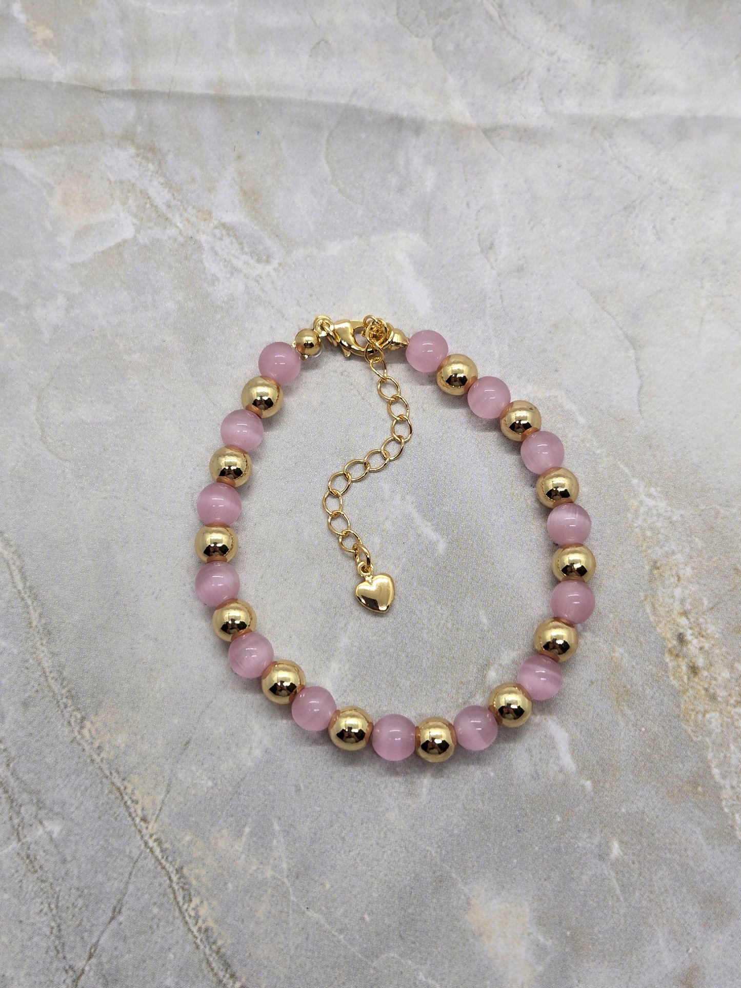 Pink Glass and gold plated beads