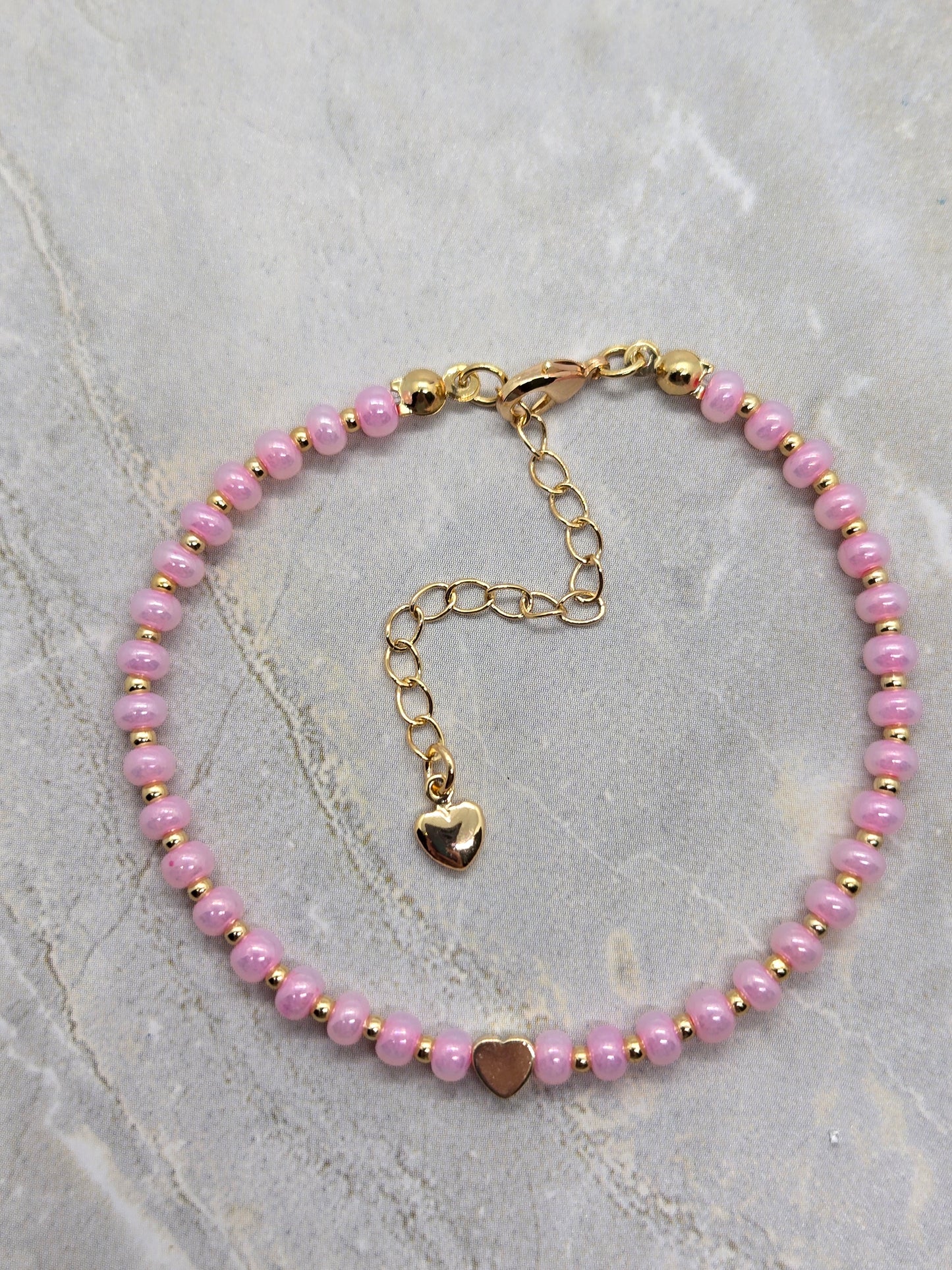 Pink Glass and gold heart plated beads