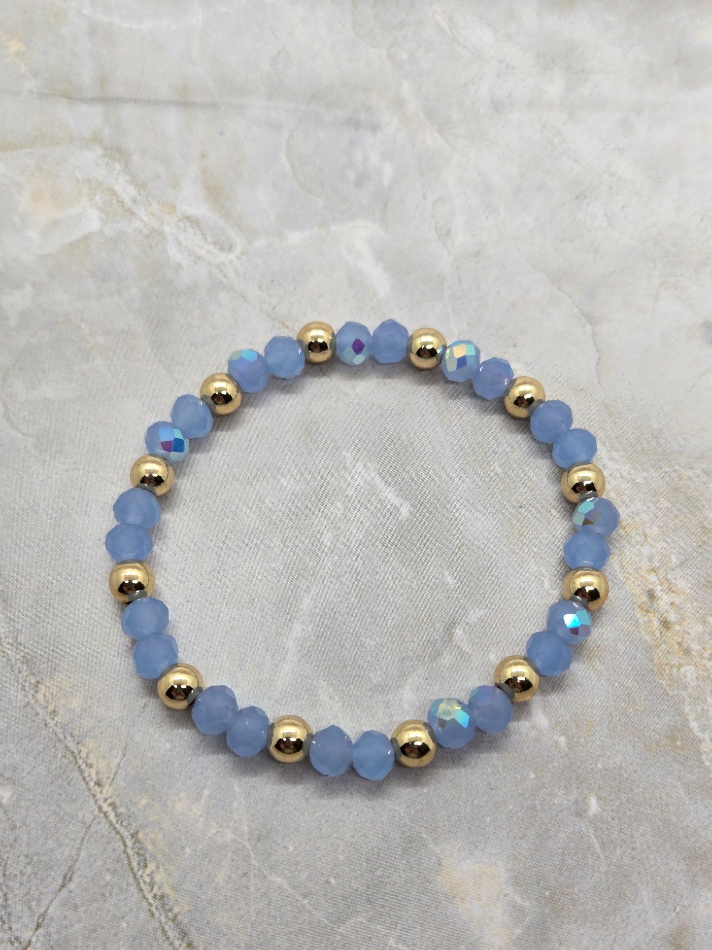 Light blue and gold plated beads elastic bracelet