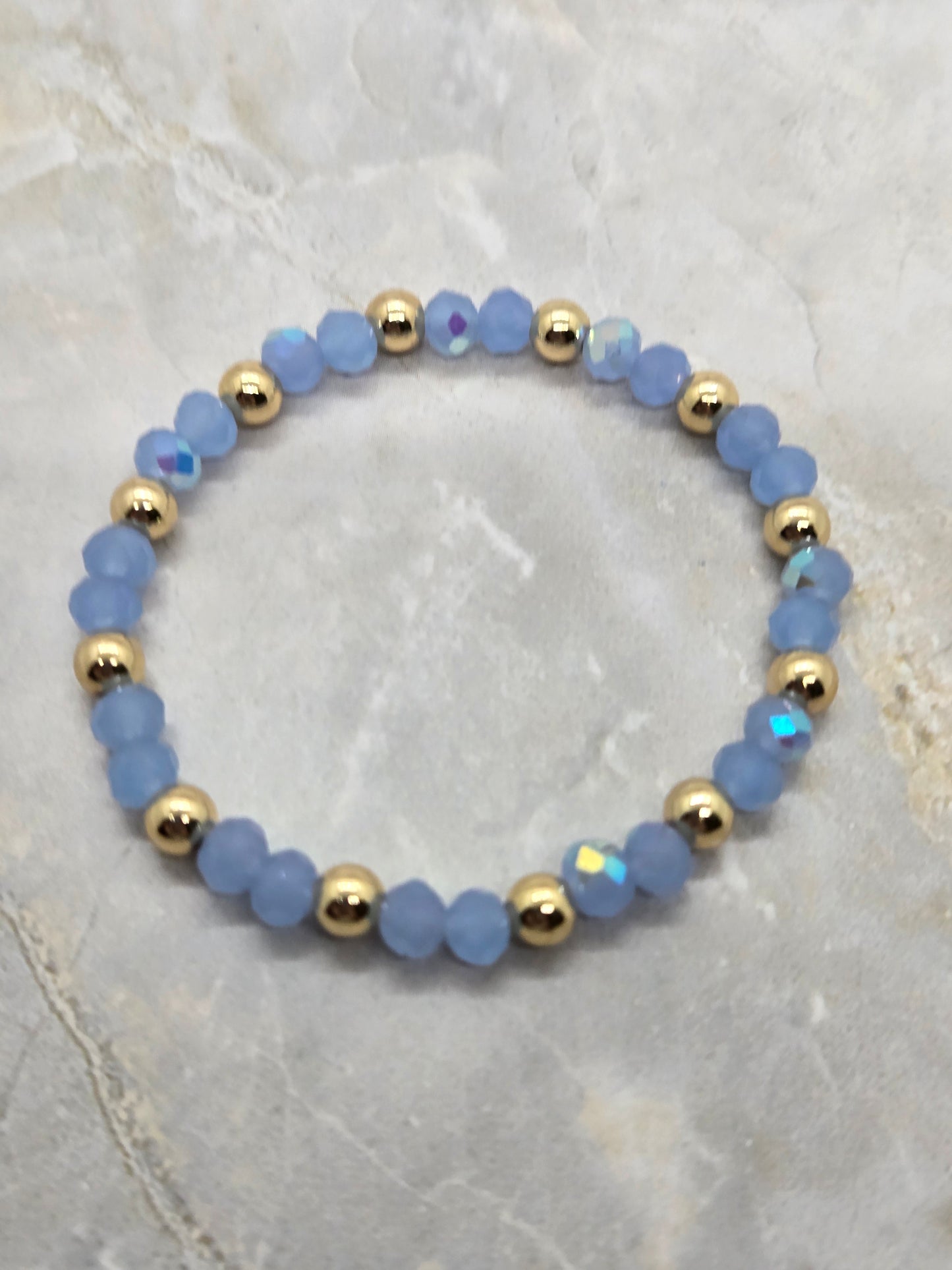 Light blue and gold plated beads elastic bracelet
