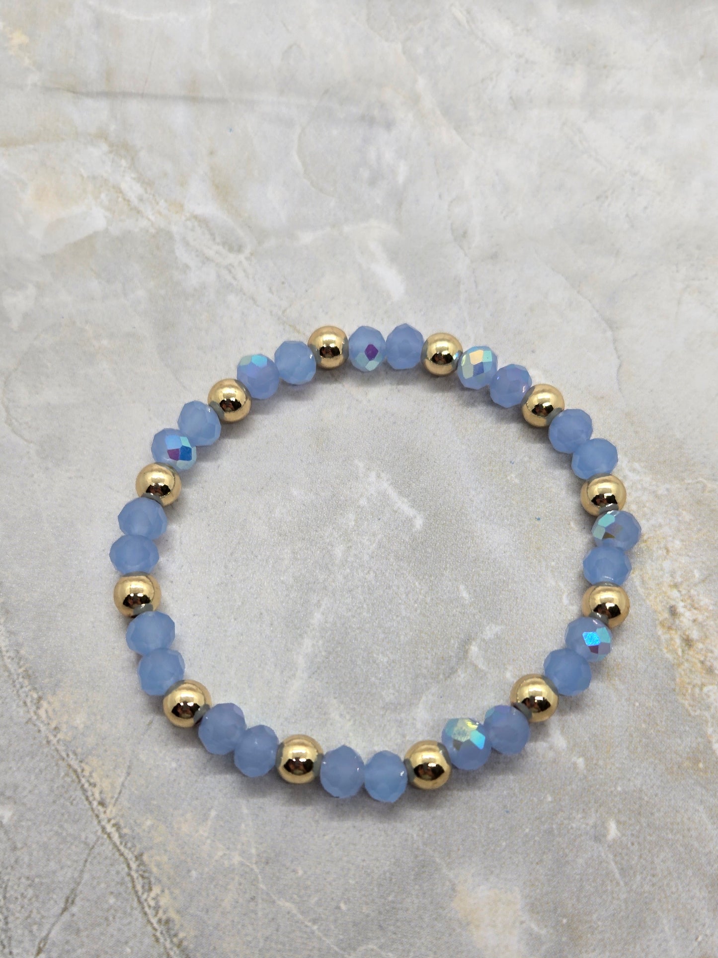 Light blue and gold plated beads elastic bracelet
