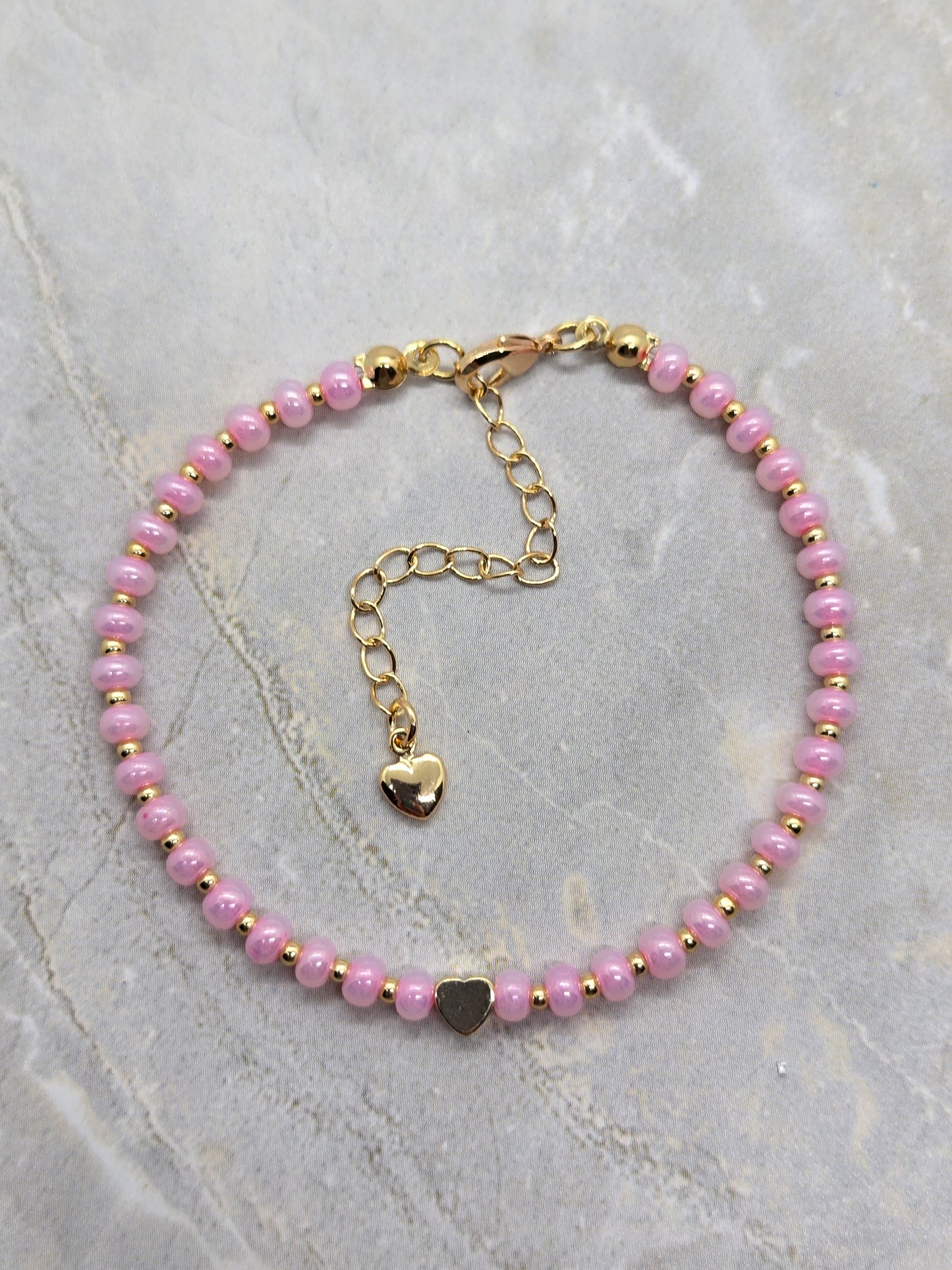 Pink Glass and gold heart plated beads