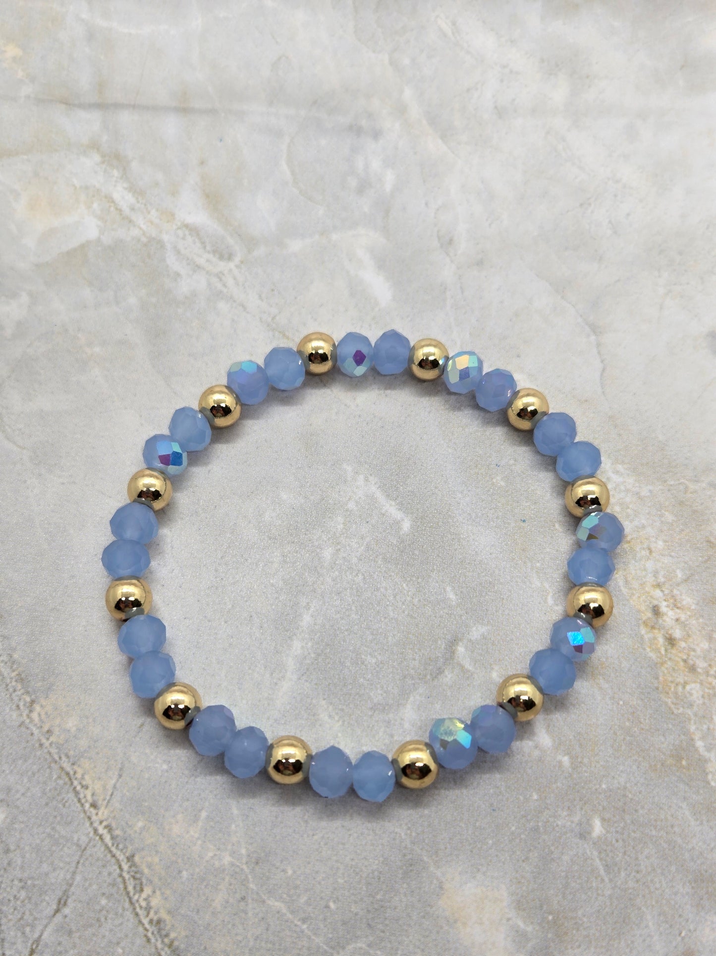 Light blue and gold plated beads elastic bracelet