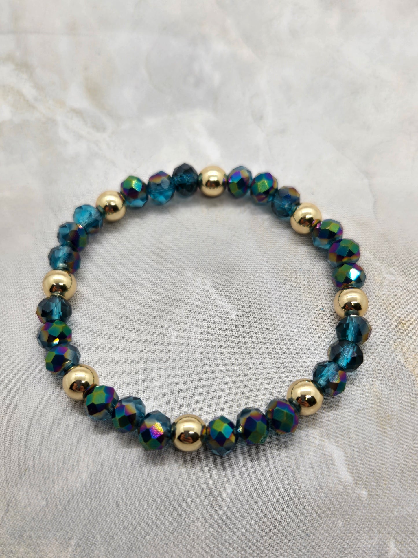Dark green and gold plated beads