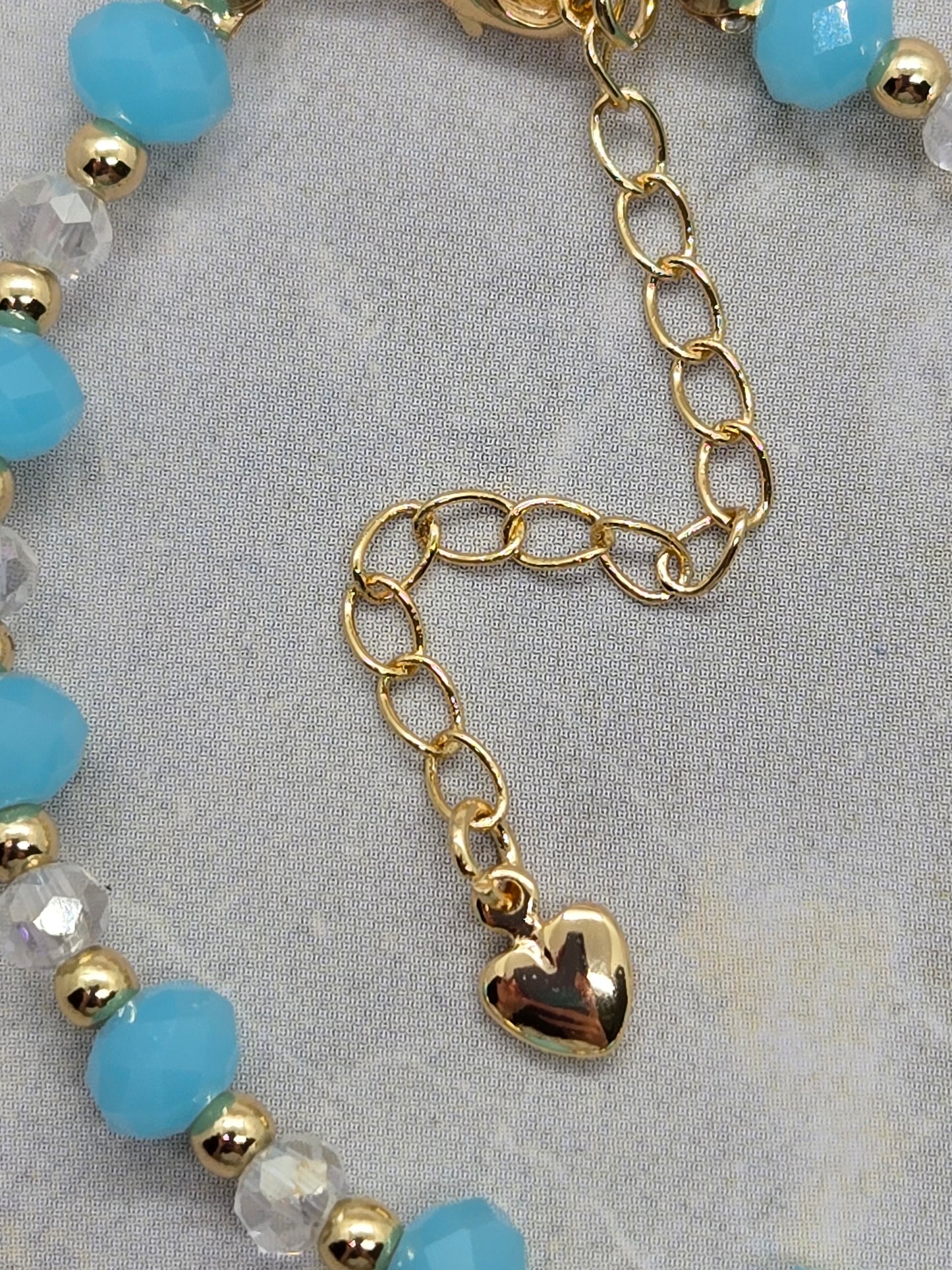 Light blue and gold plated beads bracelet