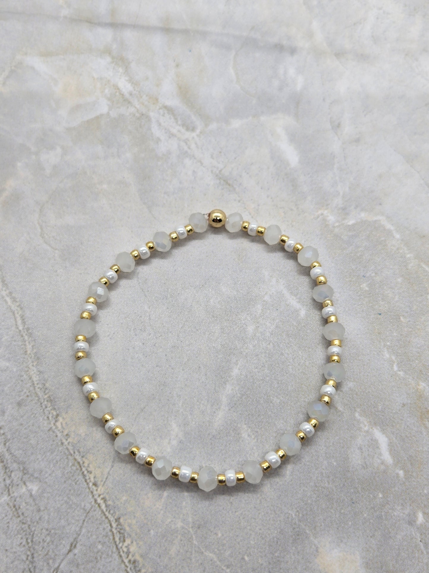 White and gold elastic bracelet 6.5 inch
