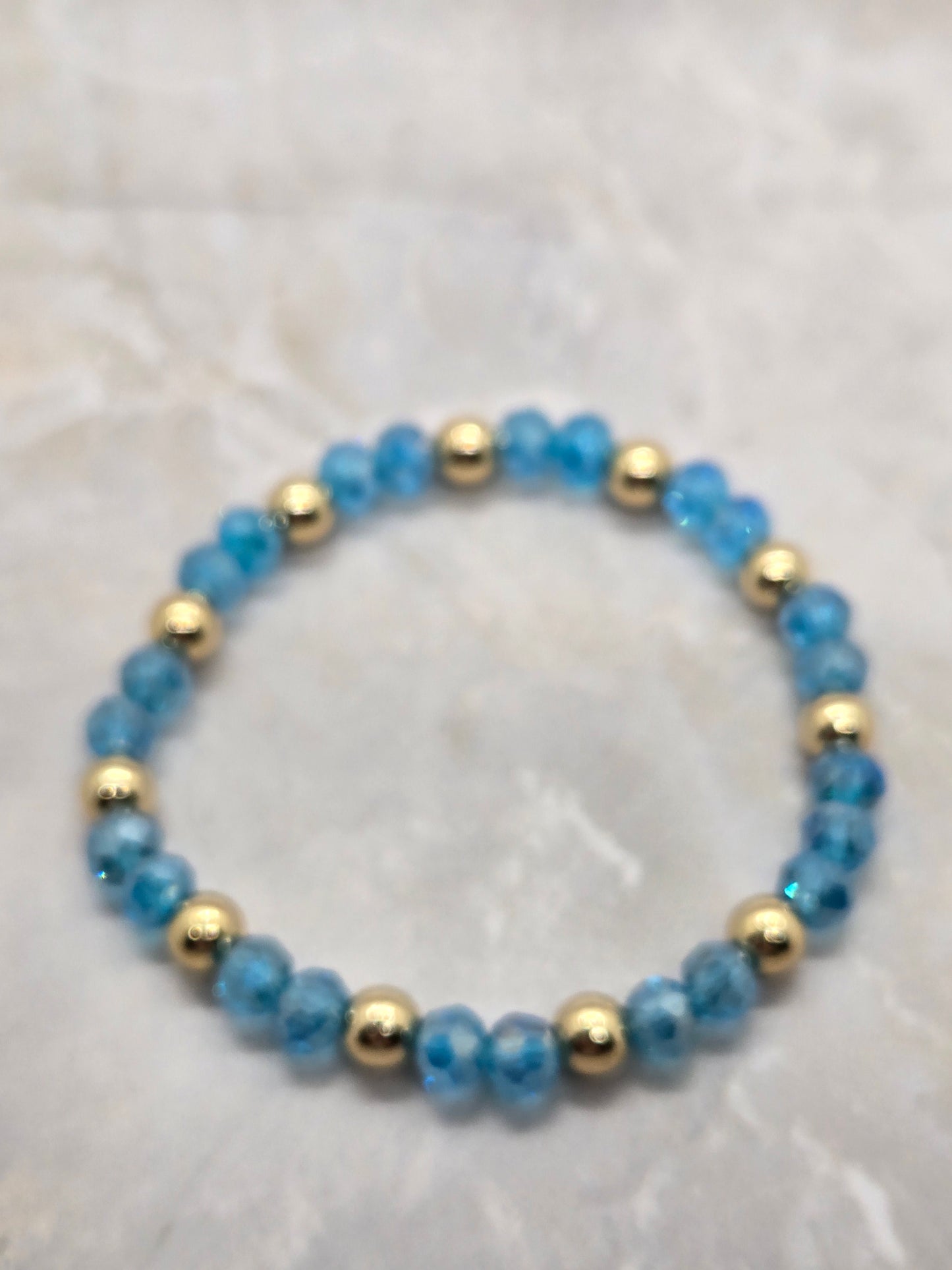 Blue and gold plated elastic bracelet