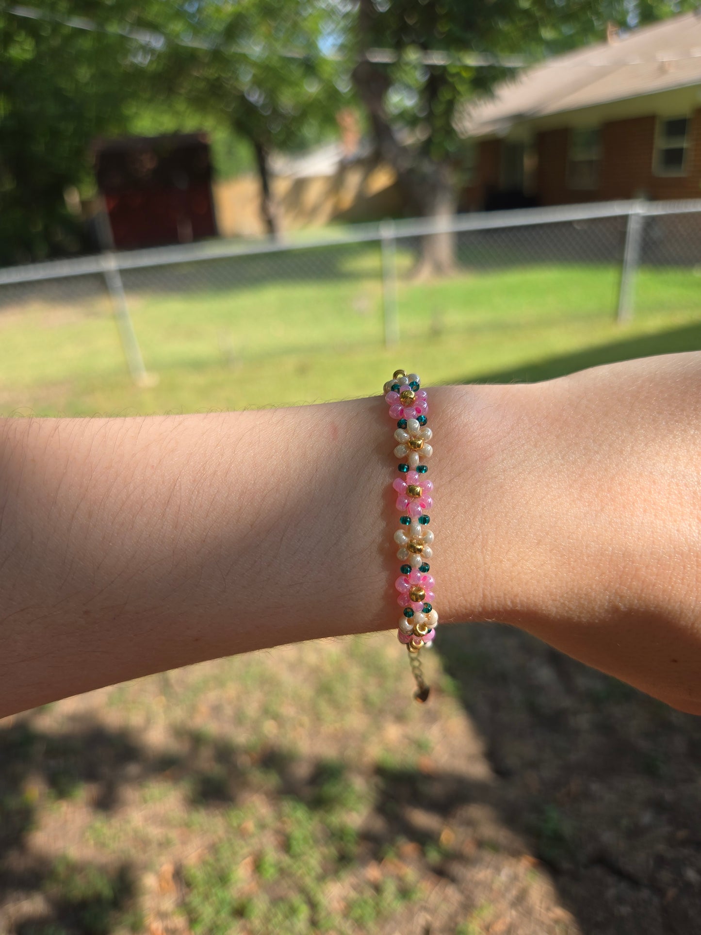 Pink and green Daisy bracelet