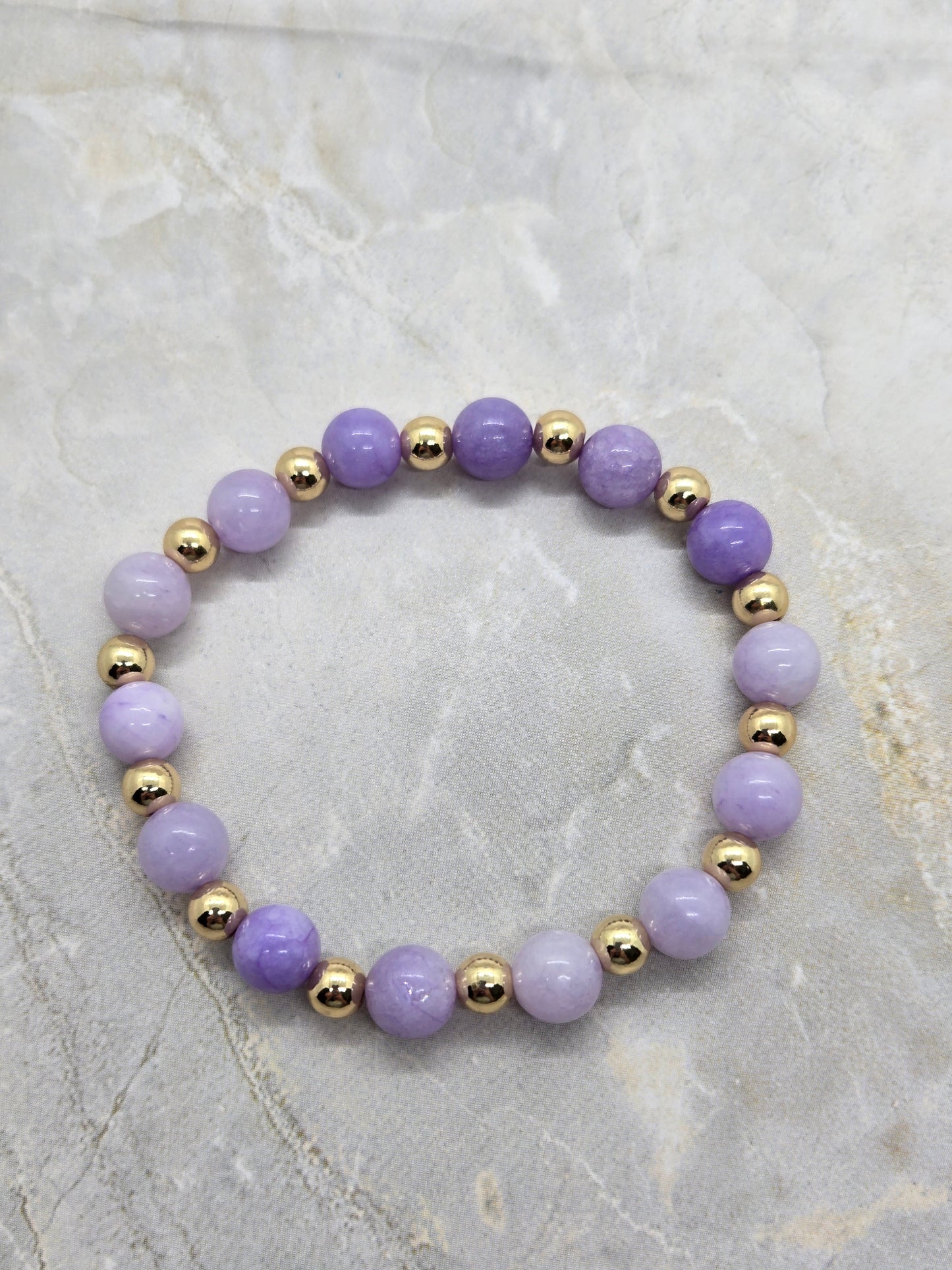 Purple and gold elastic bracelet