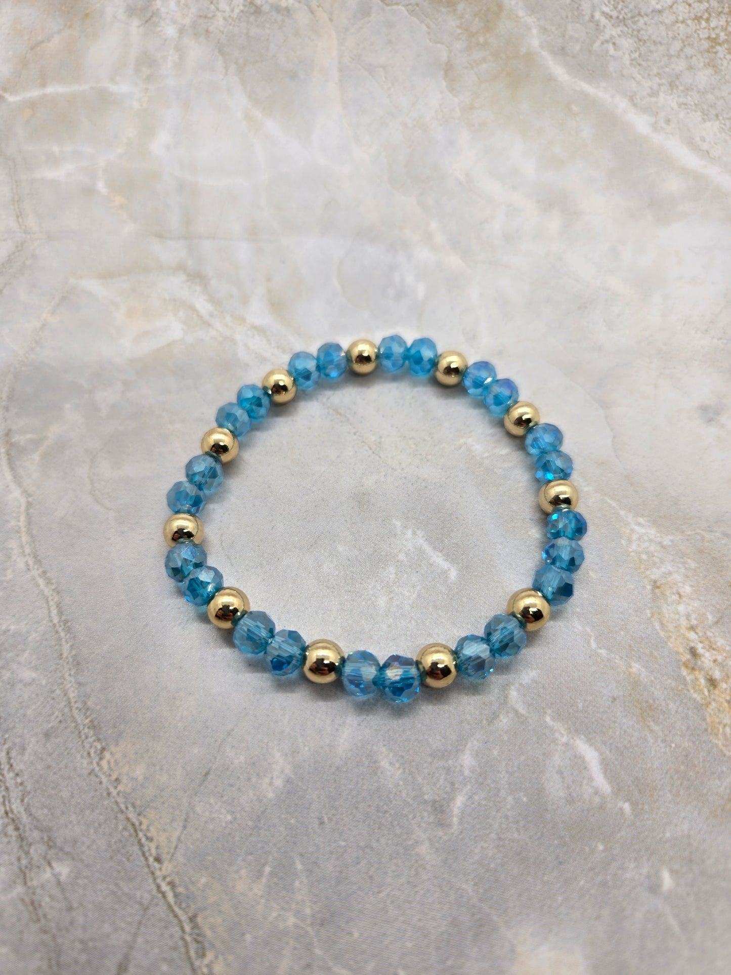 Blue and gold plated elastic bracelet