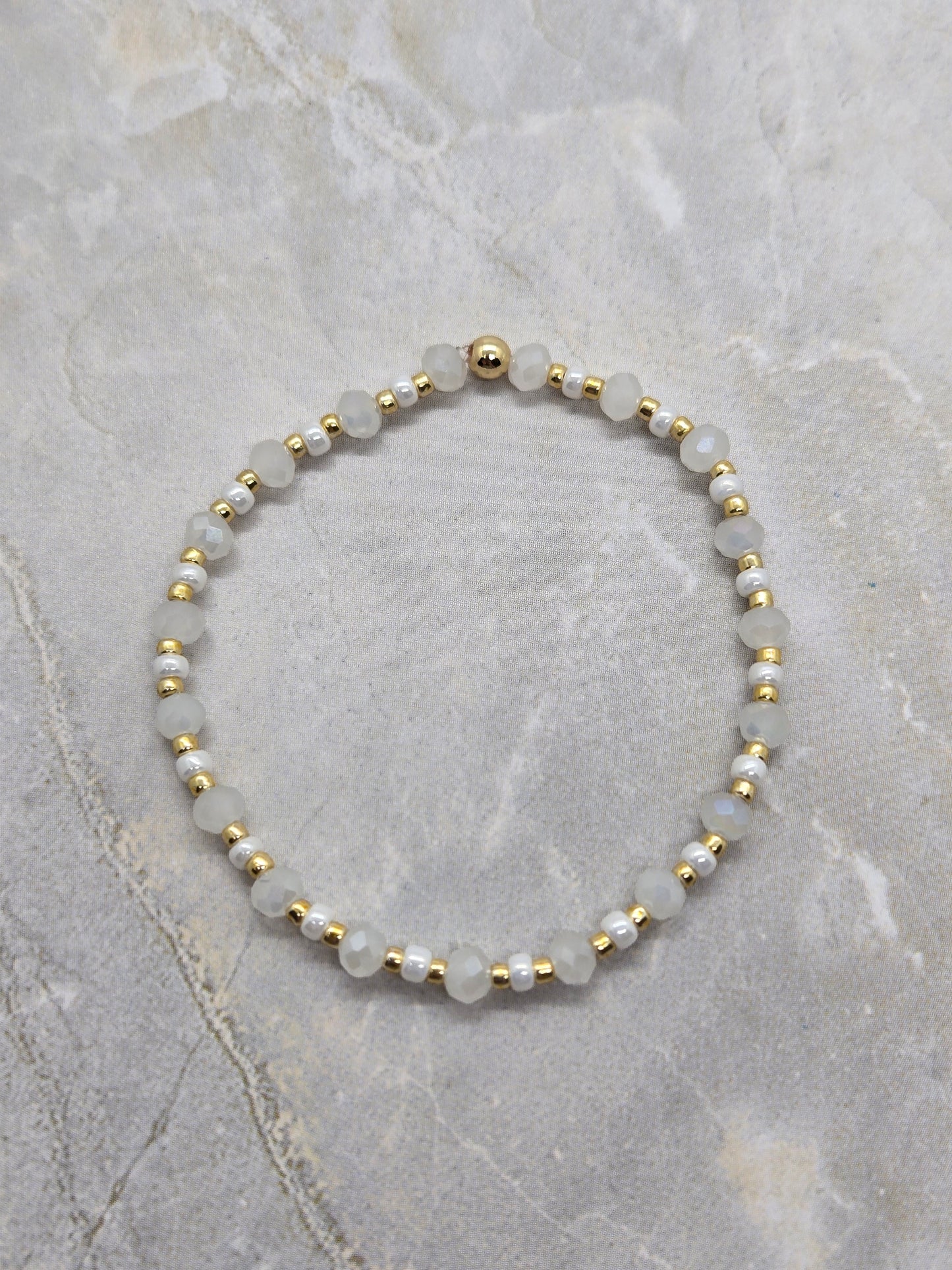 White and gold elastic bracelet 6.5 inch