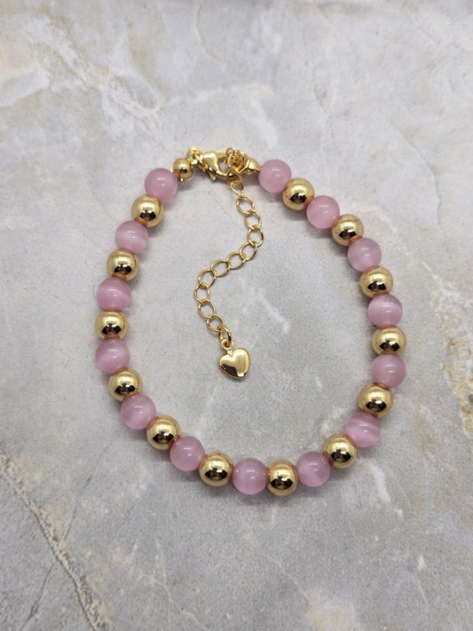Pink Glass and gold plated beads