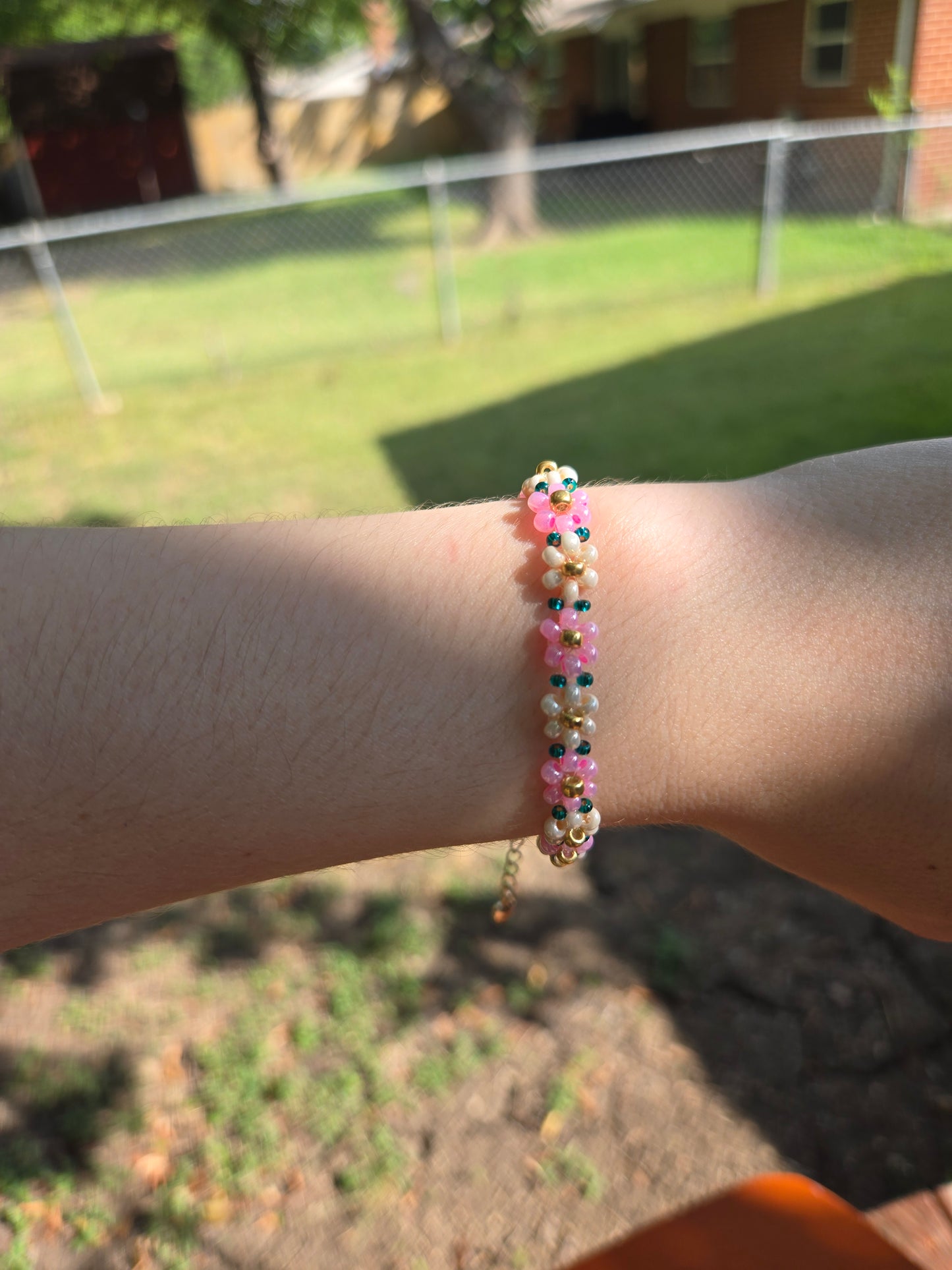 Pink and green Daisy bracelet