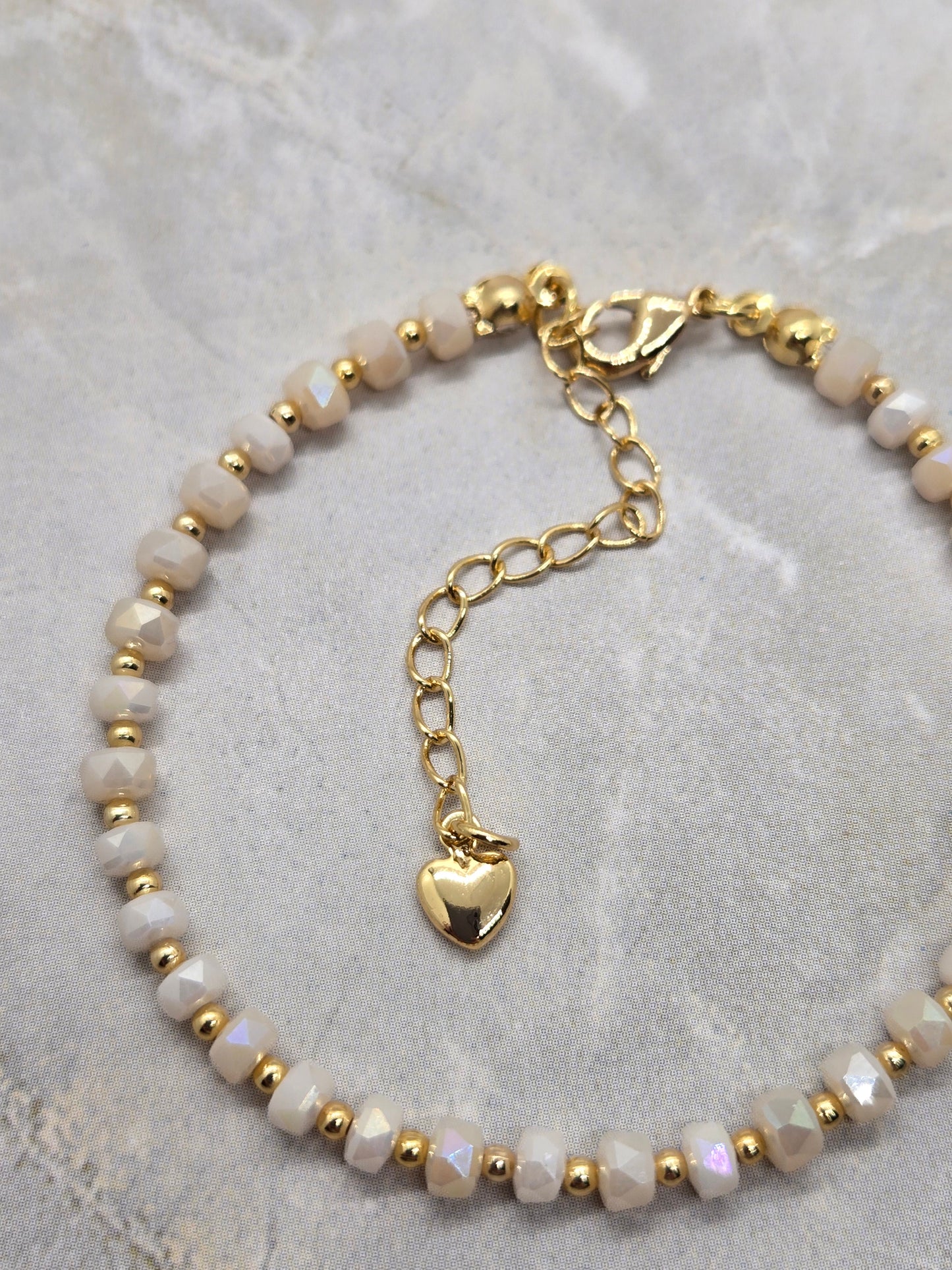 White and gold plated beads bracelet