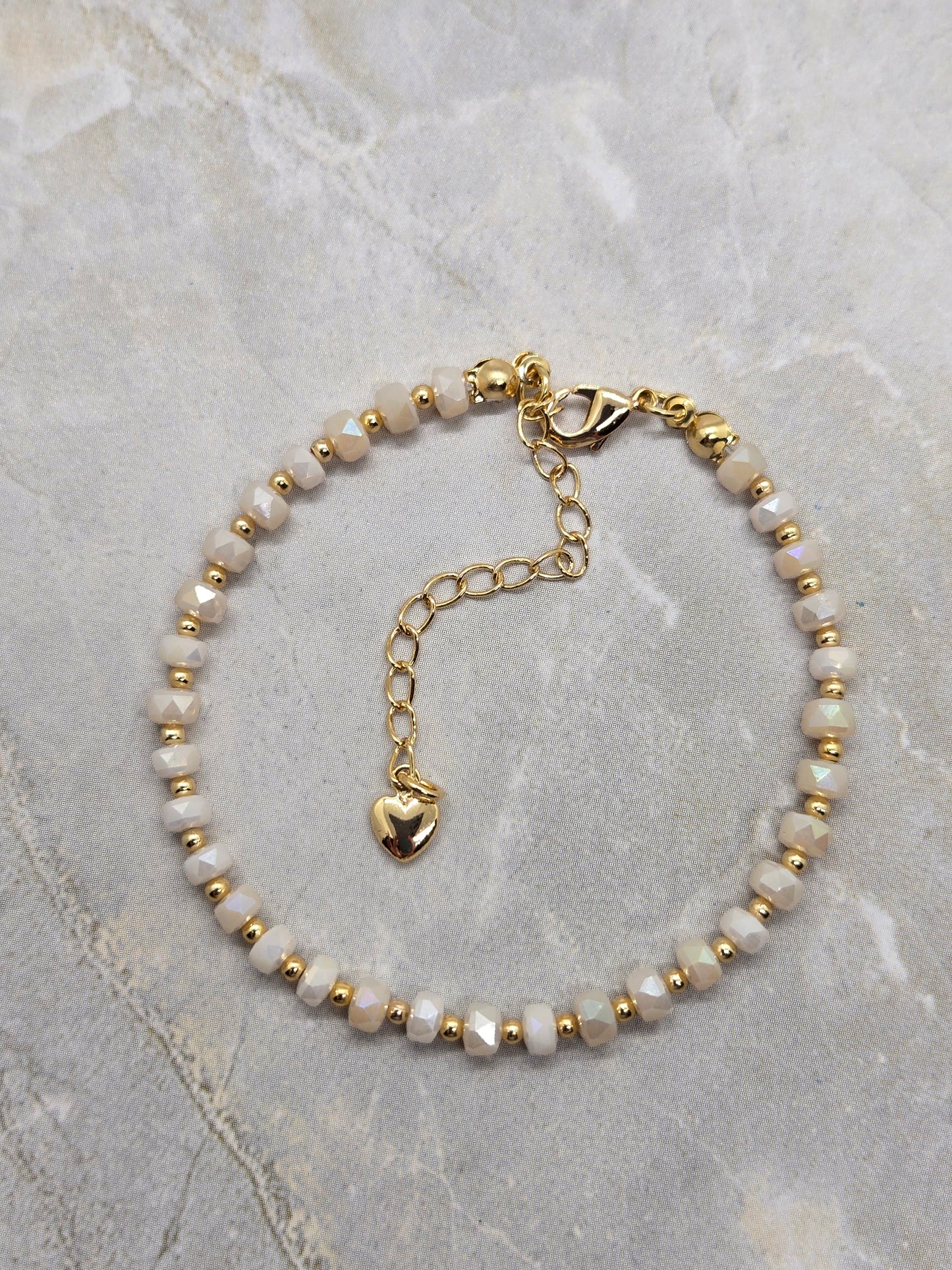 White and gold plated beads bracelet
