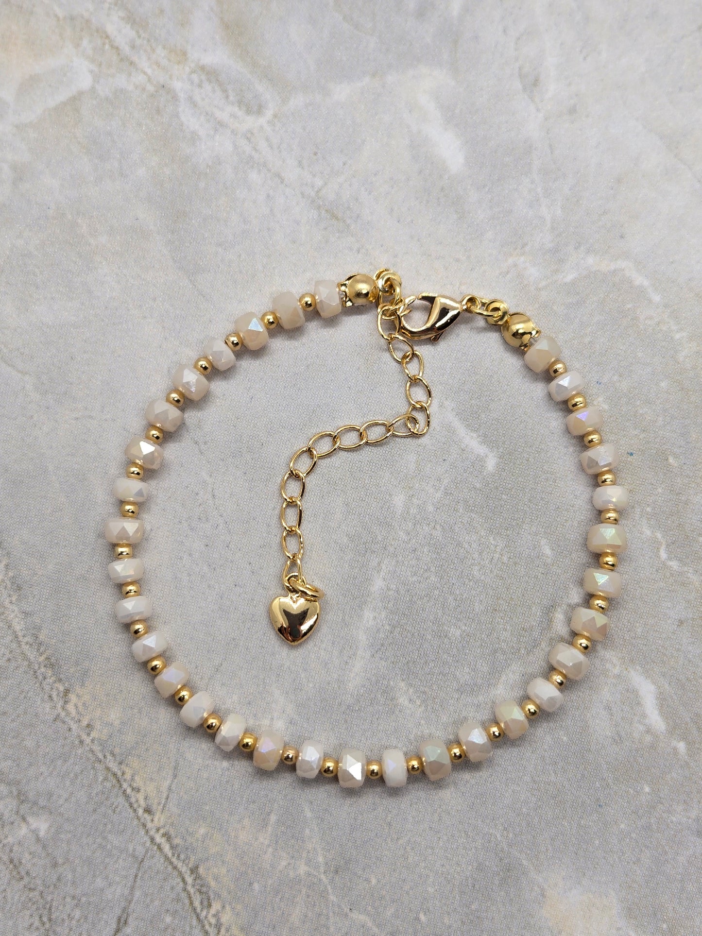 White and gold plated beads bracelet