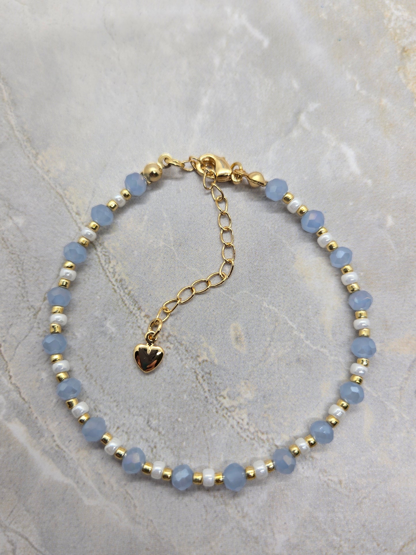 Light blue, white  and gold plated beads bracelet