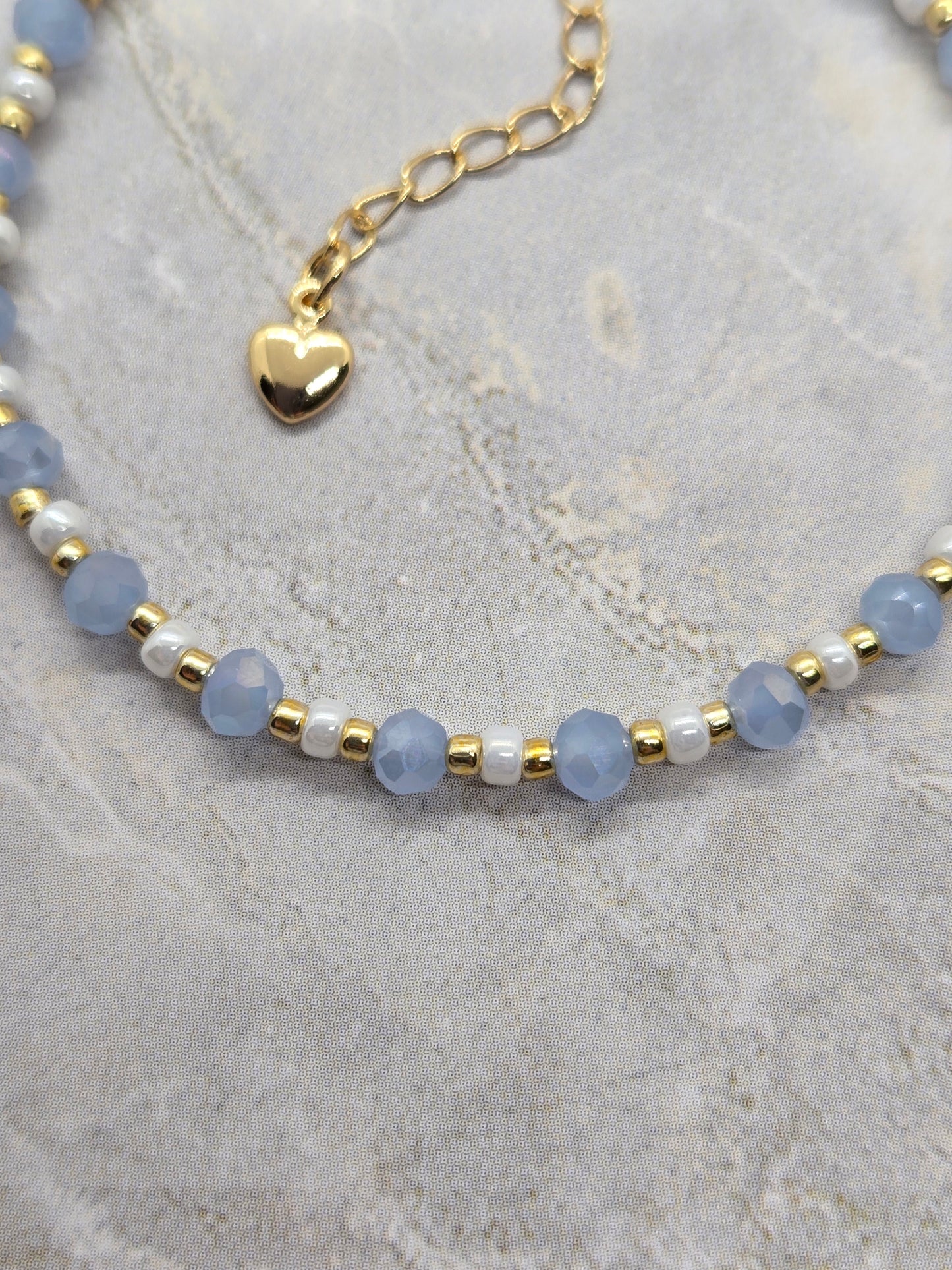Light blue, white  and gold plated beads bracelet