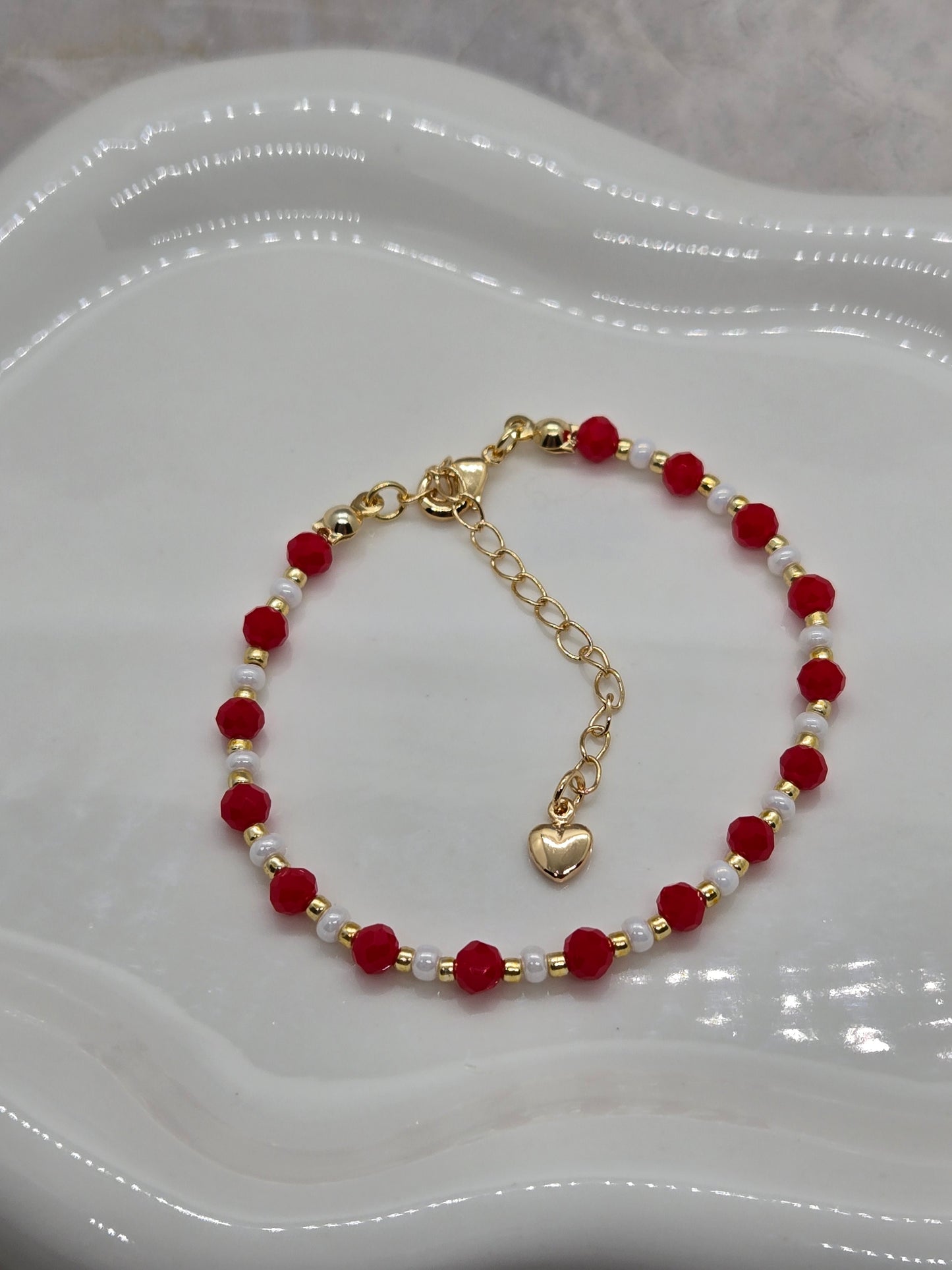 Red, white  and gold plated beads bracelet