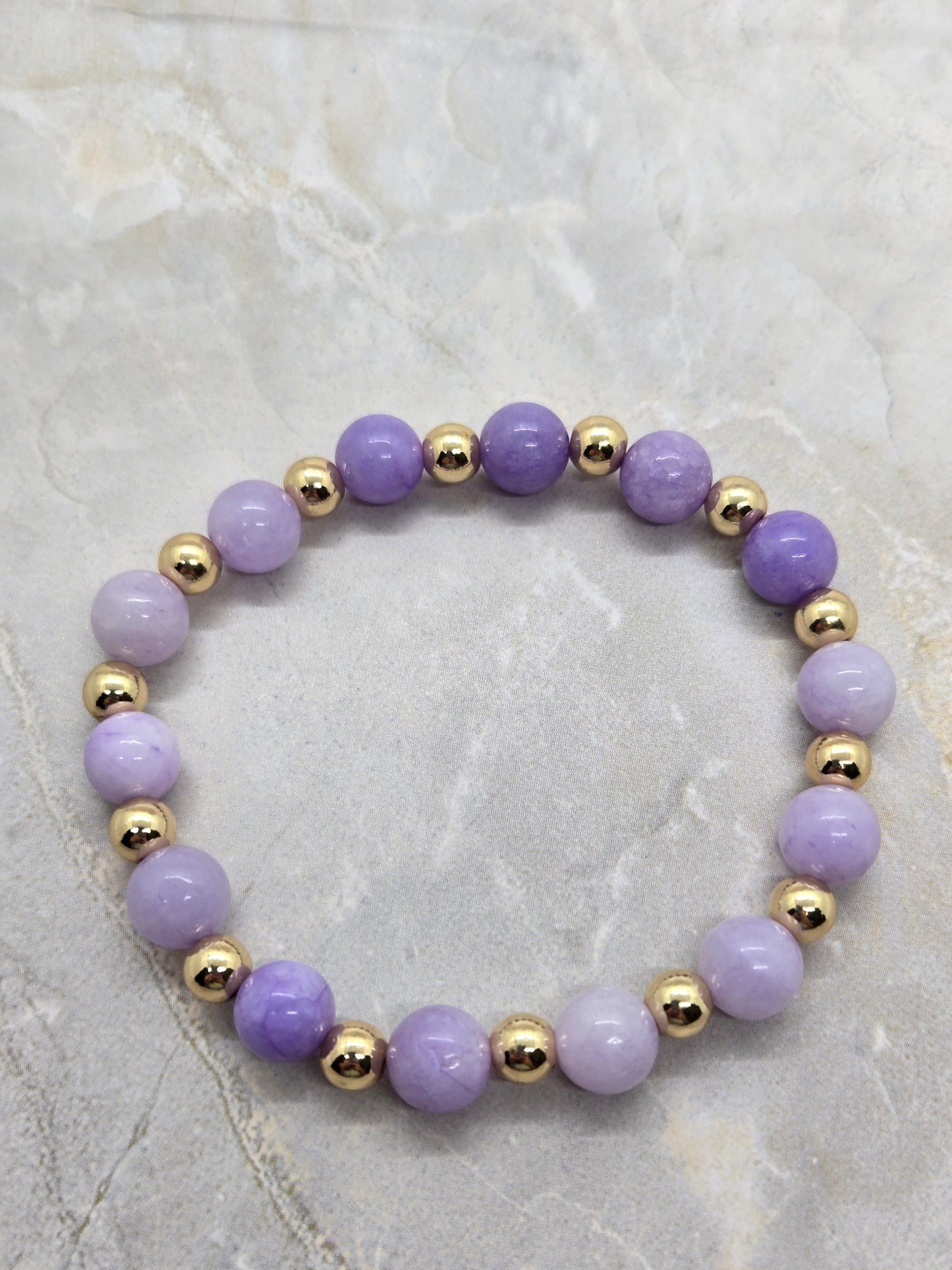 Purple and gold elastic bracelet