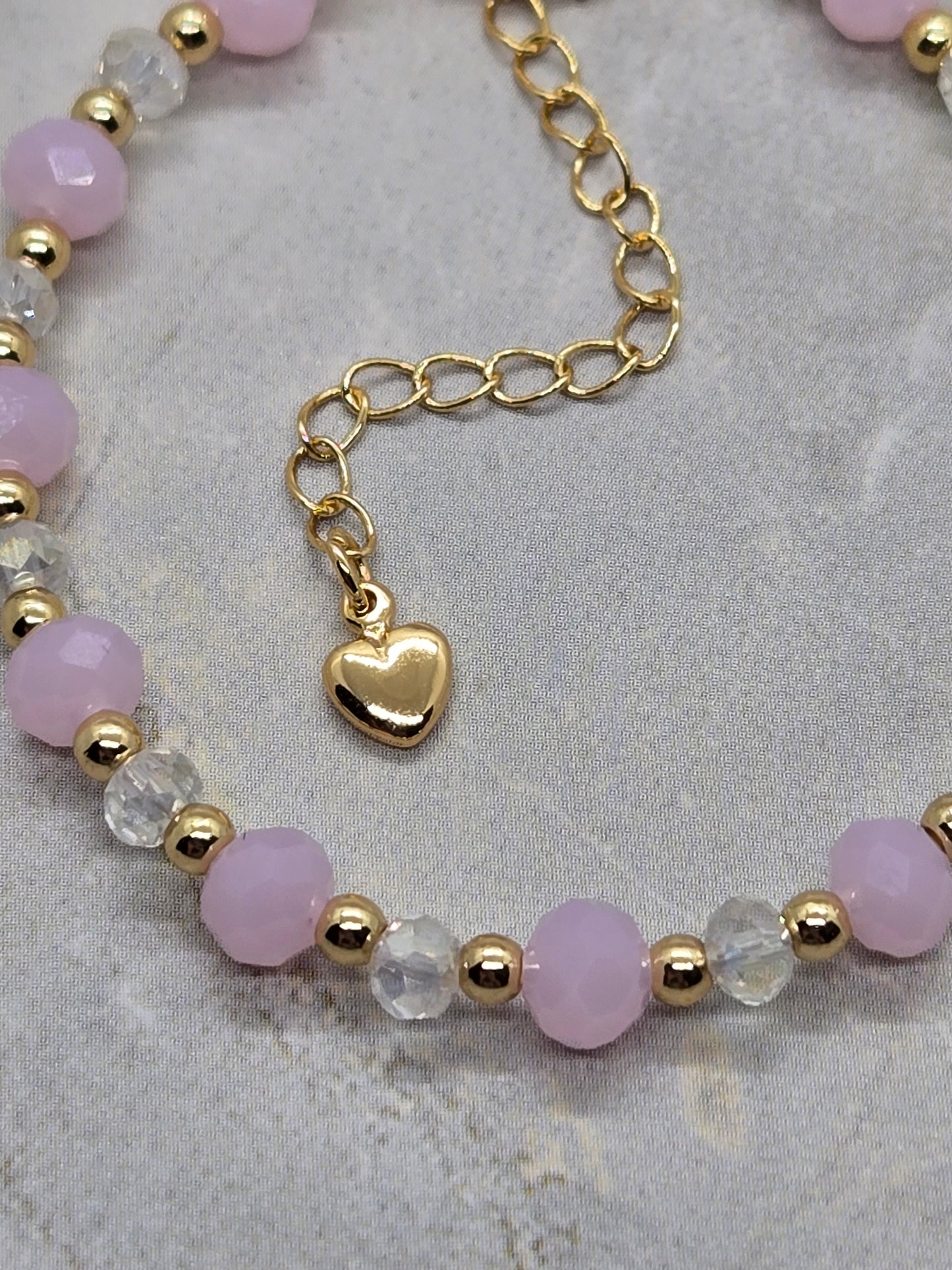 Pink, transparent and gold beads Bracelet
