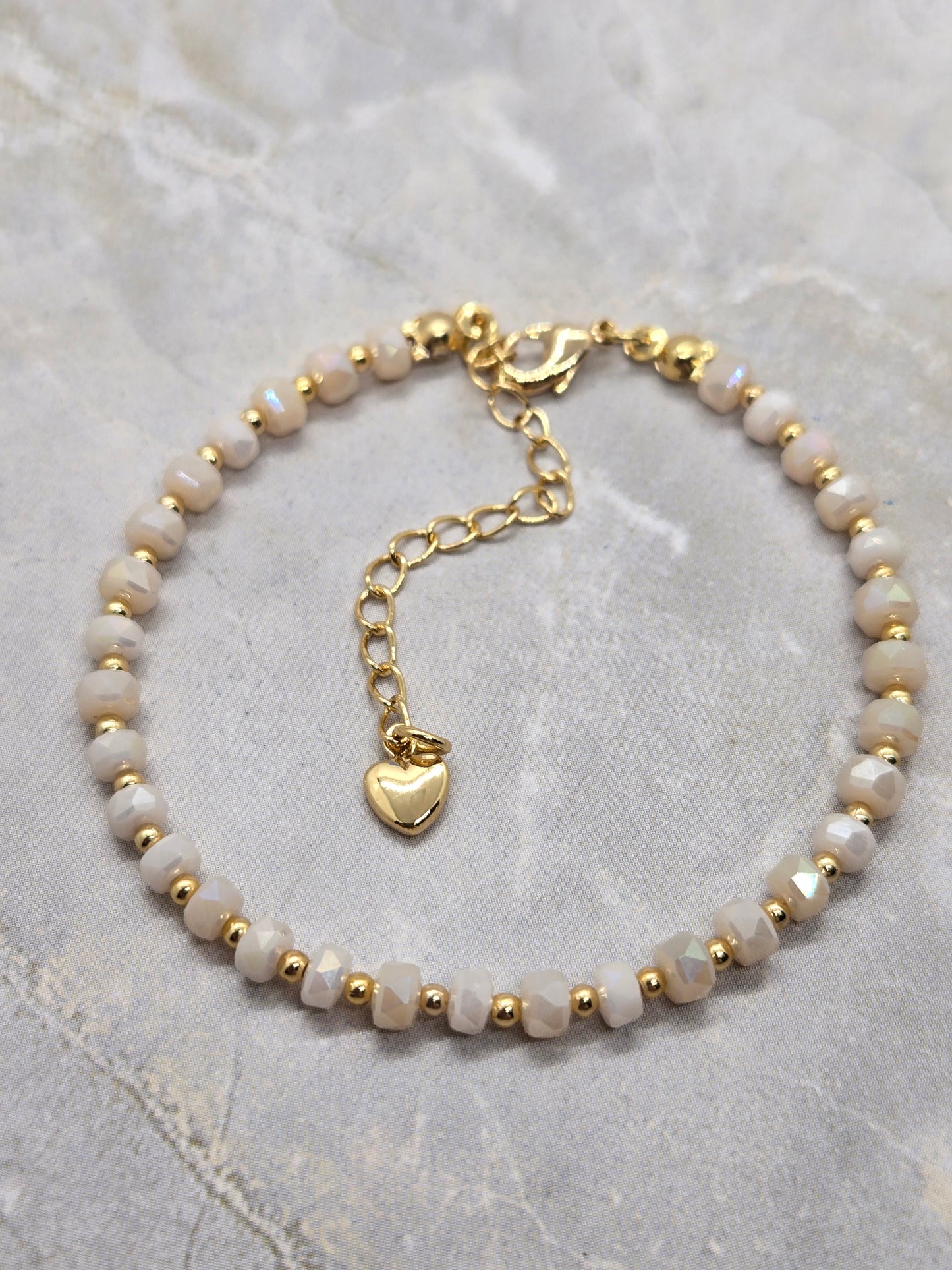 White and gold plated beads bracelet