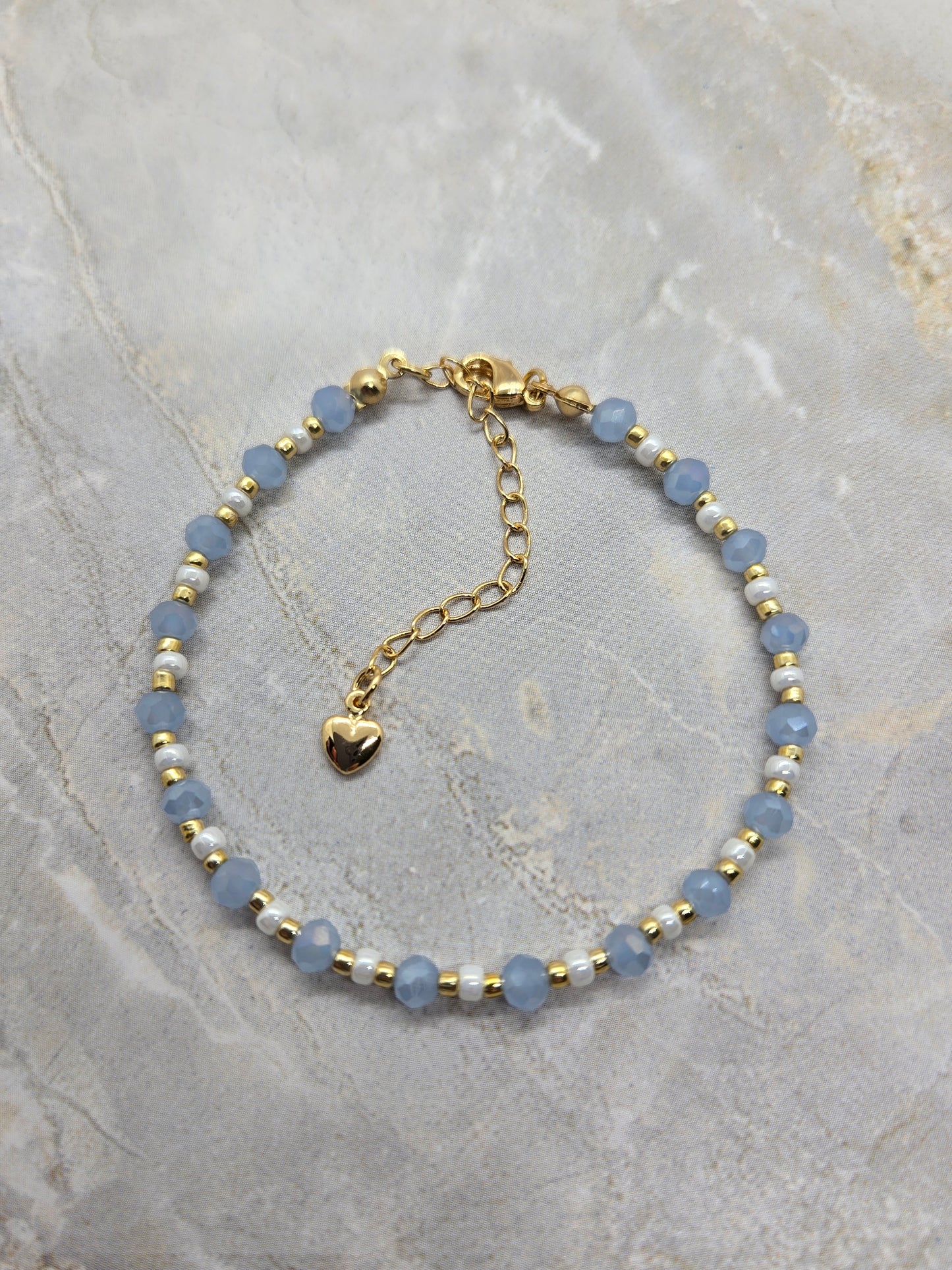 Light blue, white  and gold plated beads bracelet