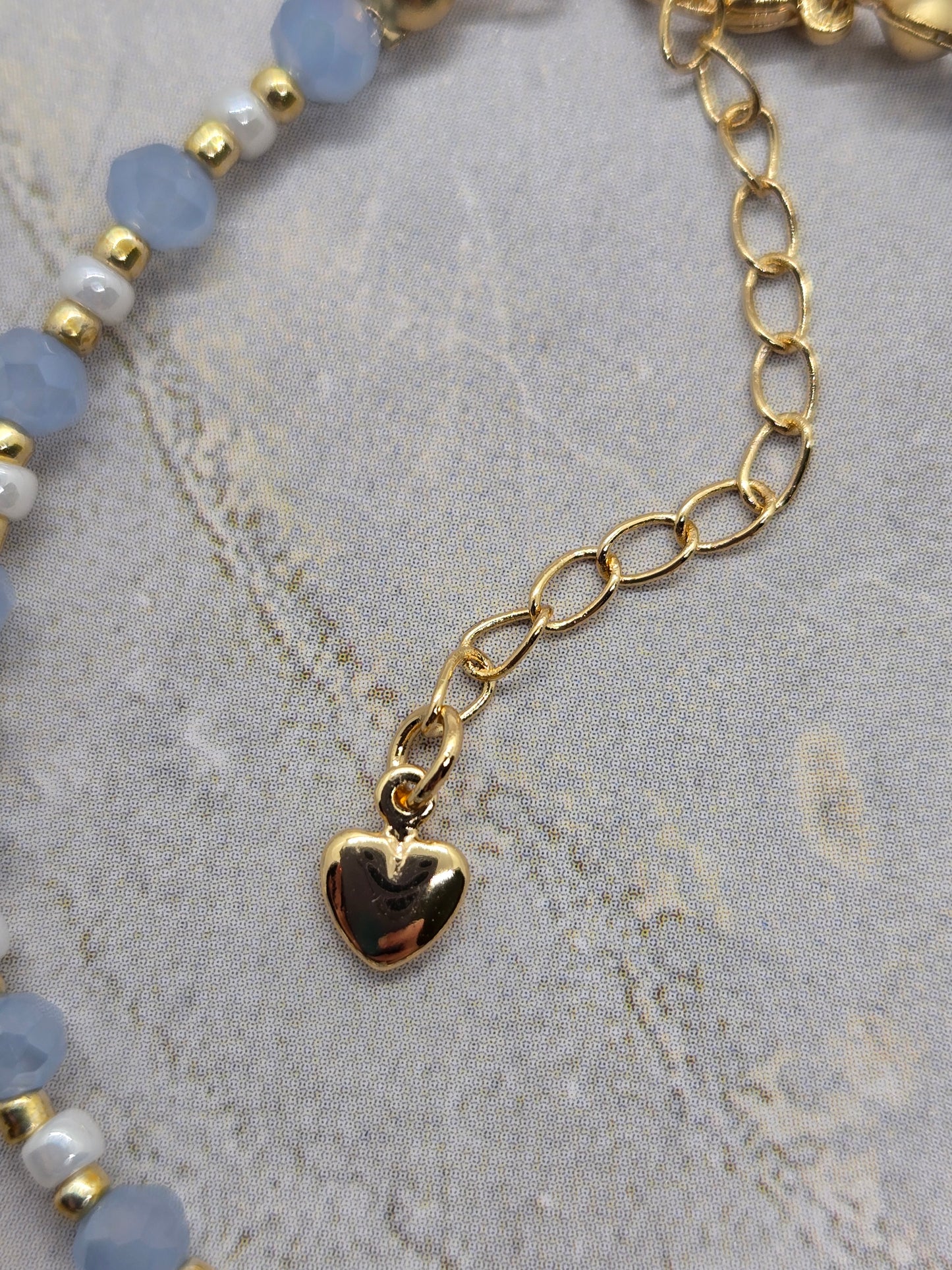 Light blue, white  and gold plated beads bracelet