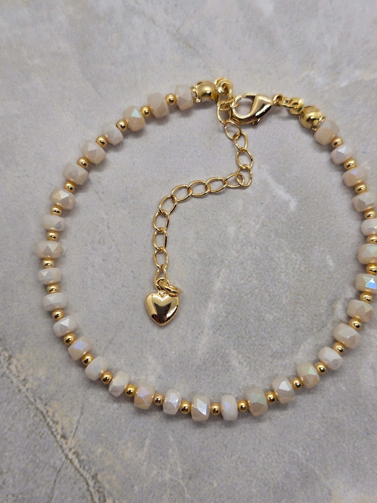 White and gold plated beads bracelet