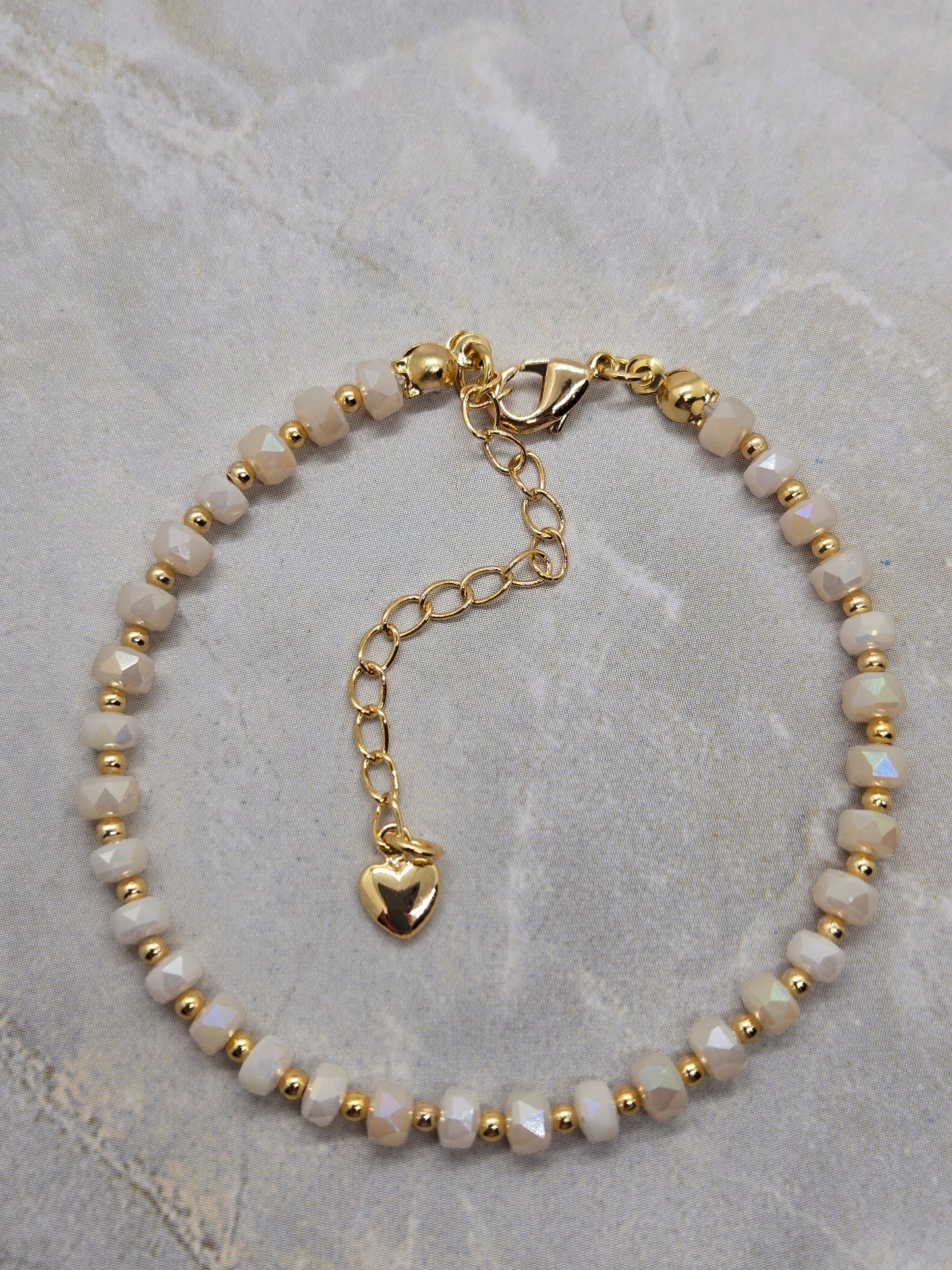 White and gold plated beads bracelet