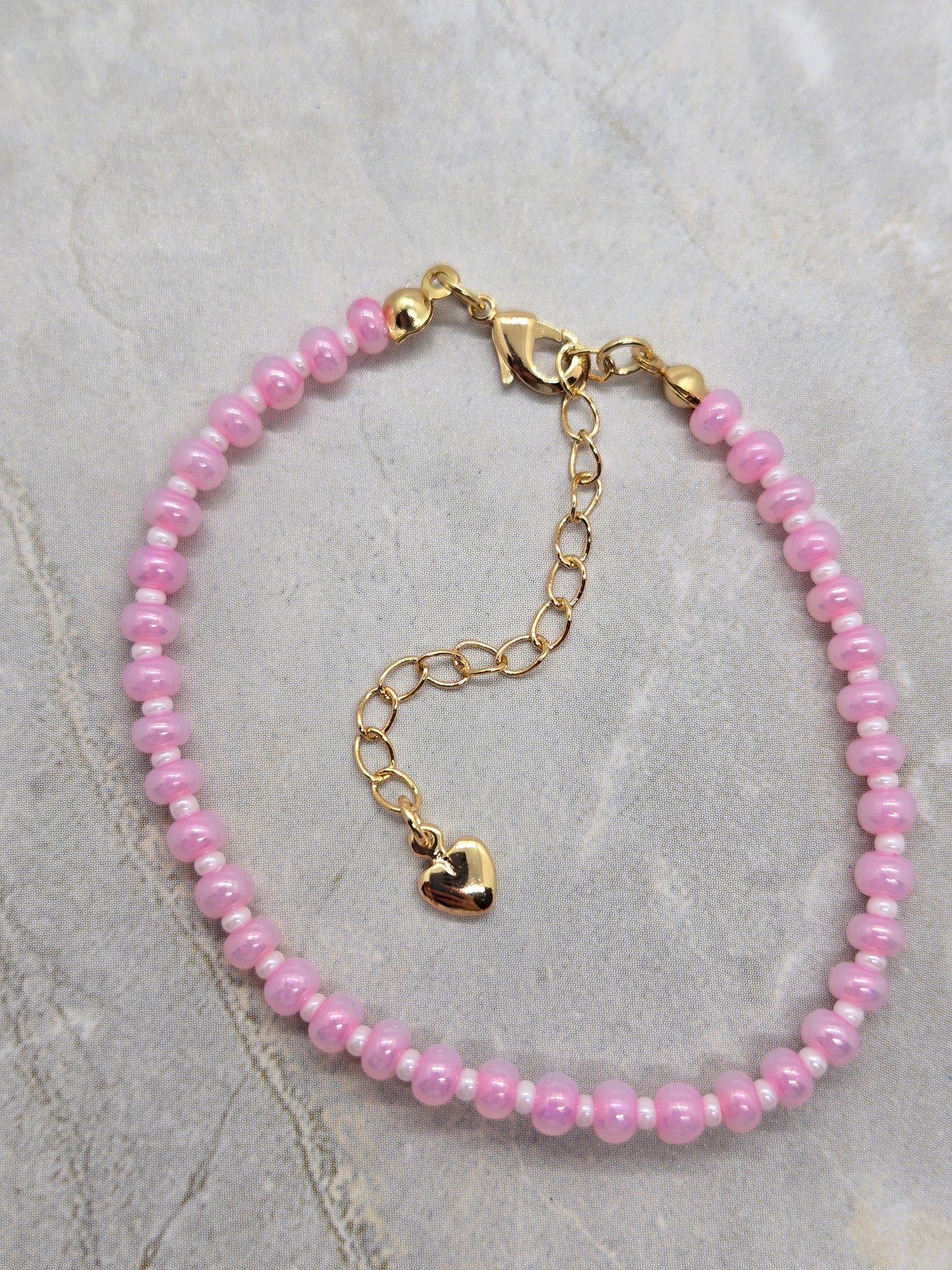 Pink and white bracelet