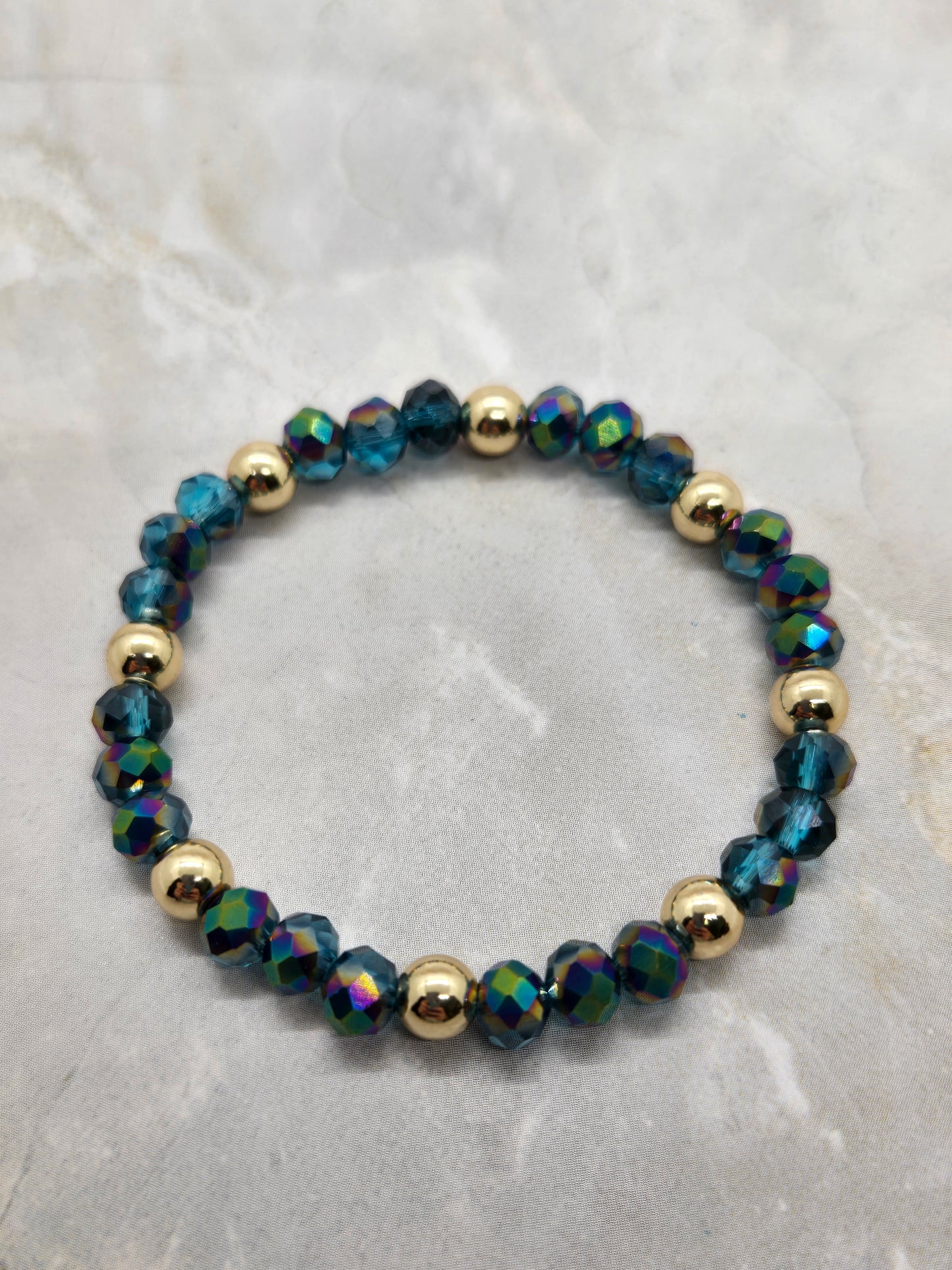 Dark green and gold plated beads