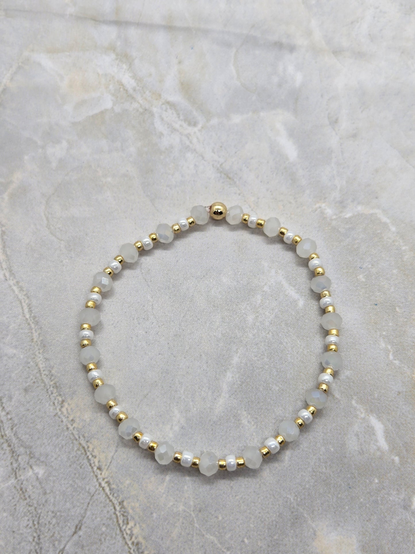 White and gold elastic bracelet 6.5 inch