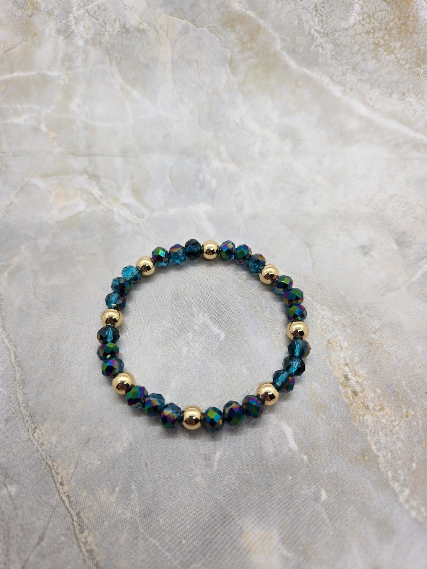 Dark green and gold plated beads